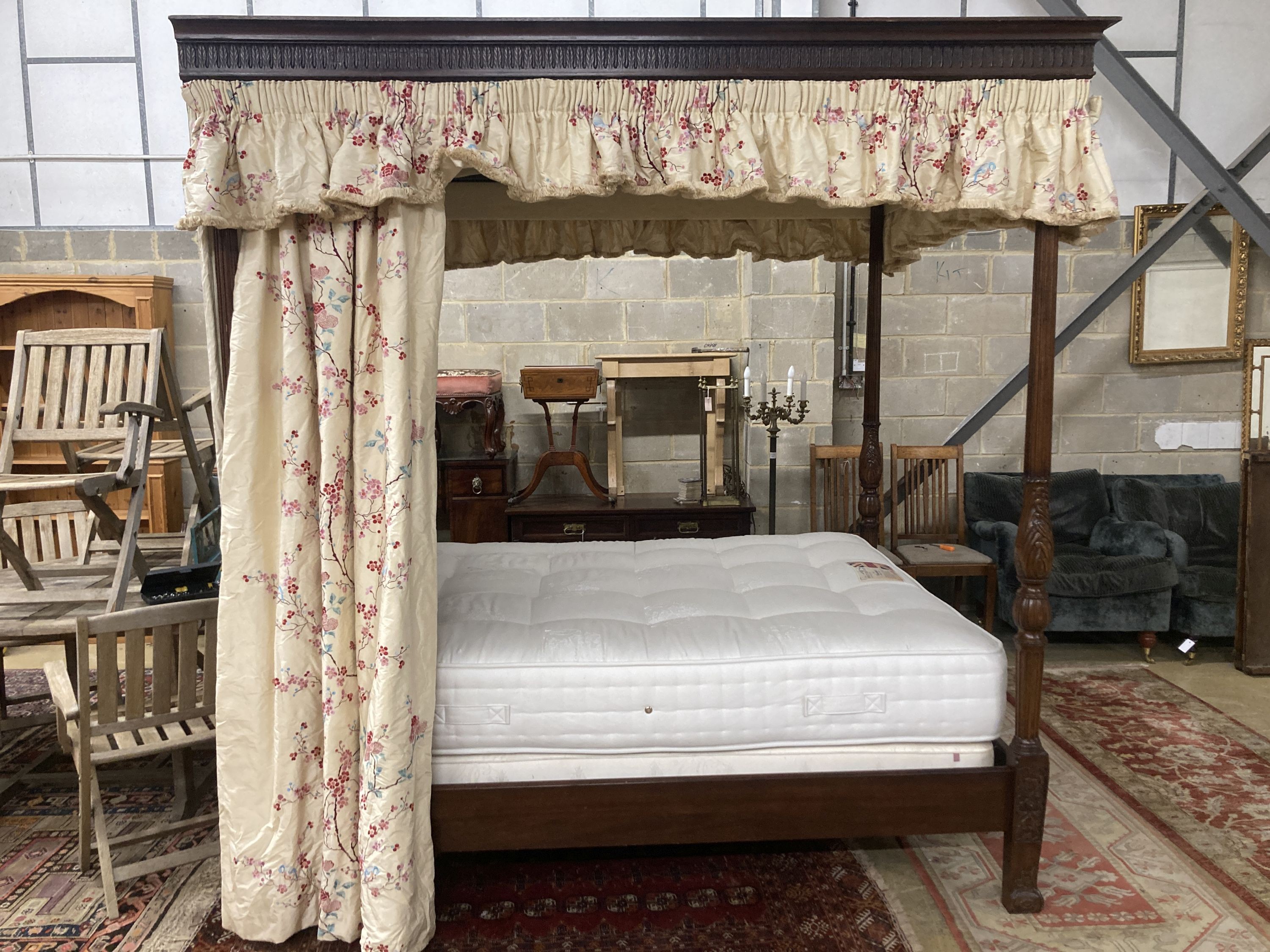 And So To Bed. A George III style mahogany four poster 5ft bedstead, together with drapes, divan and mattress, L.215cm